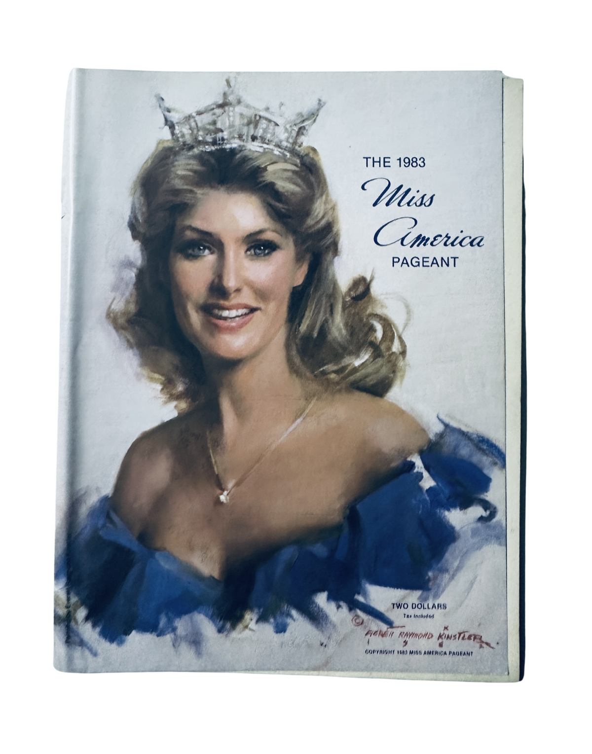Cover of The 1983 Miss America Pageant Magazine featuring a portrait of Debra Maffett, showcasing her wearing a crown and blue gown, emphasizing the prestige of the event.