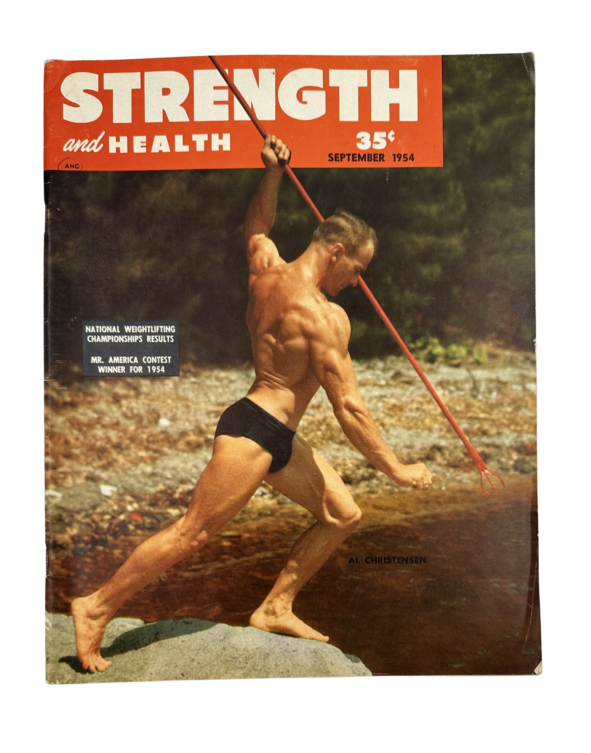 Cover of Strength and Health Magazine, September 1954, featuring Al Christensen posing dynamically with a spear, highlighting the theme of strength and fitness.