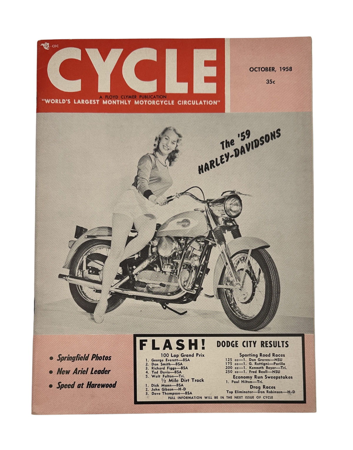 Cycle Magazine October 1958 featuring the cover story on the 1959 Harley-Davidsons and models, showcasing a woman and a vintage motorcycle.