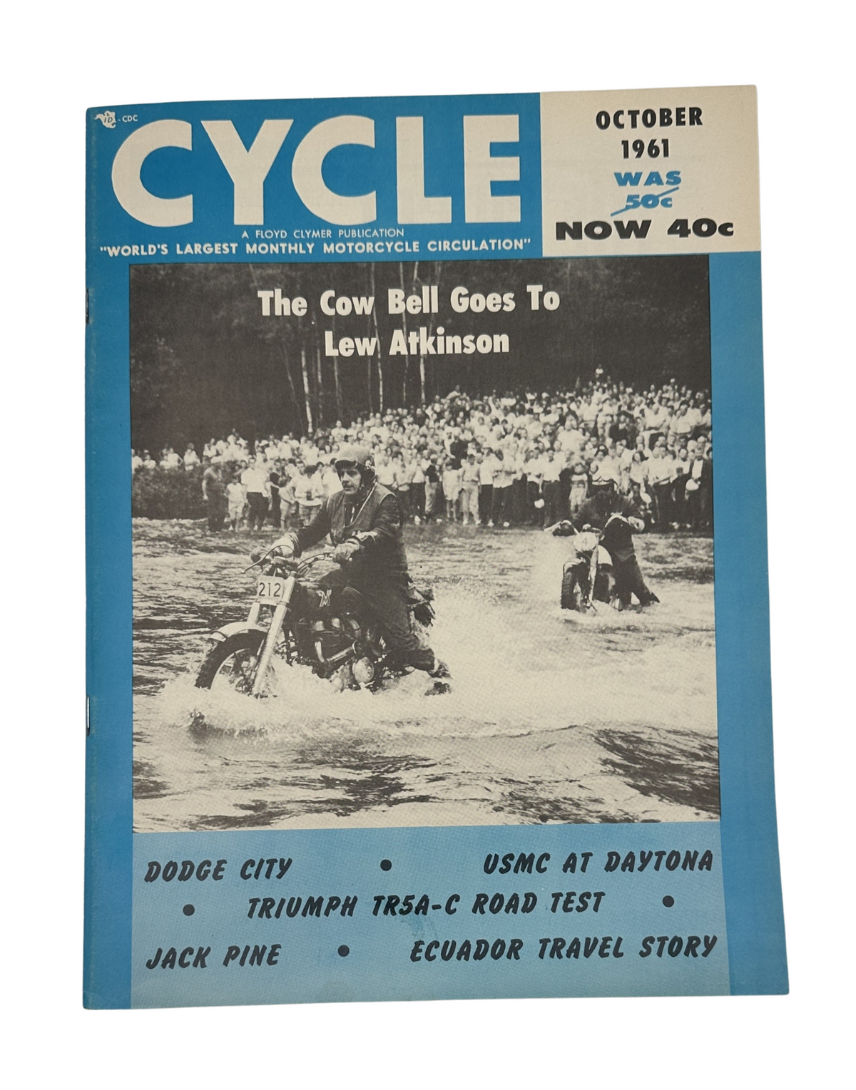Cycle Magazine October 1961 featuring Lew Atkinson on the cover, showcasing a motorbike event with cyclists riding on a dirt track.