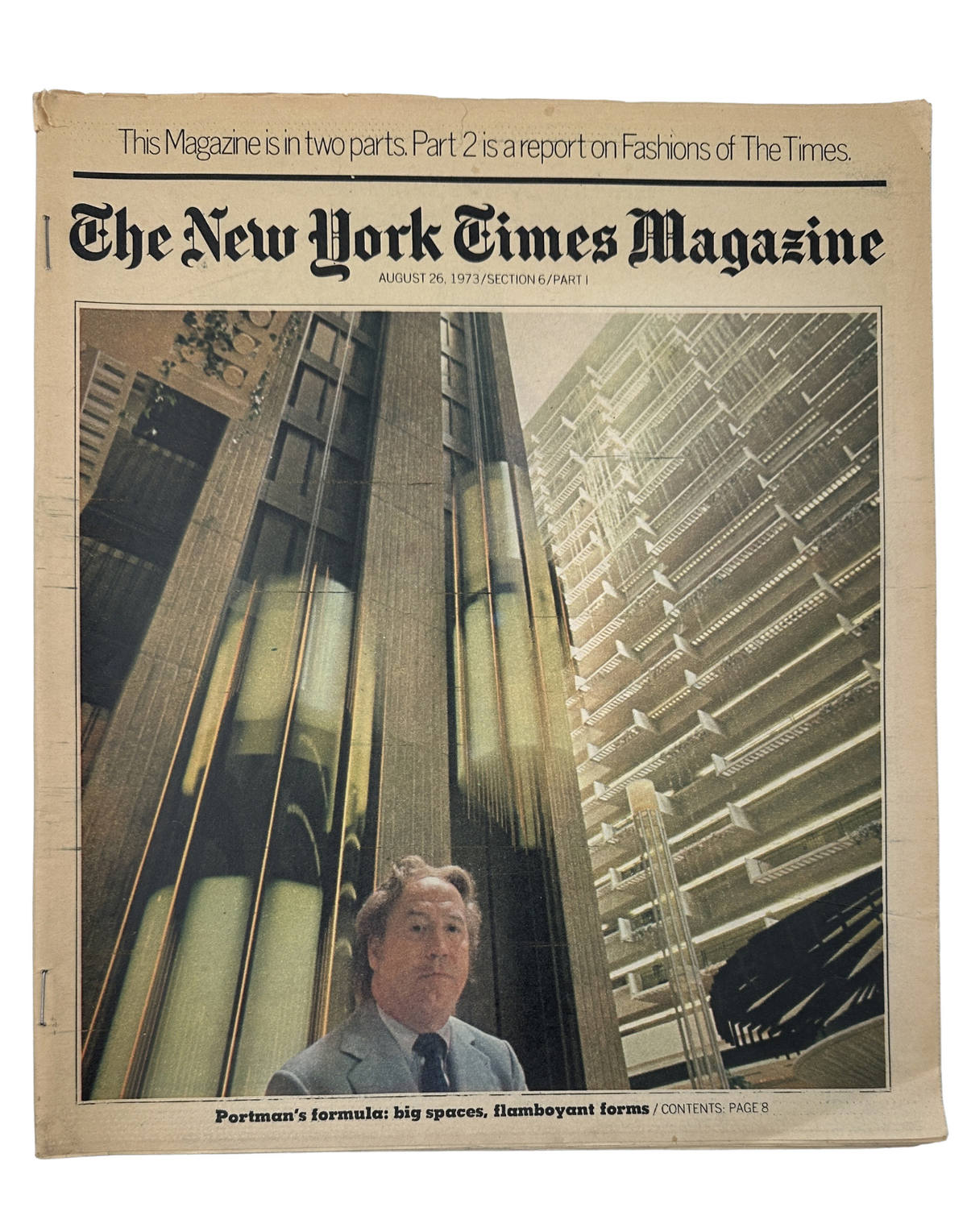 The New York Times Magazine August 26, 1973 featuring a cover story on architect John Portman. The cover showcases a photo of Portman in an atrium, highlighting his influential urban renewal concepts.