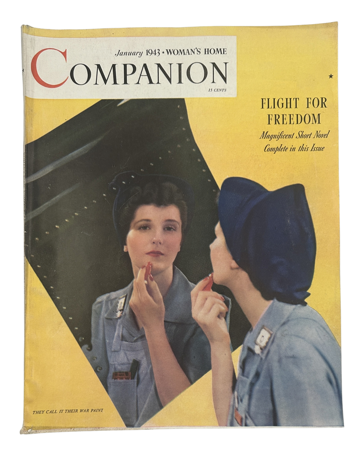 Cover of Woman’s Home Companion Magazine, January 1943, featuring the title 'Flight for Freedom'. The image shows a woman applying lipstick while looking in a mirror, set against a vibrant background.