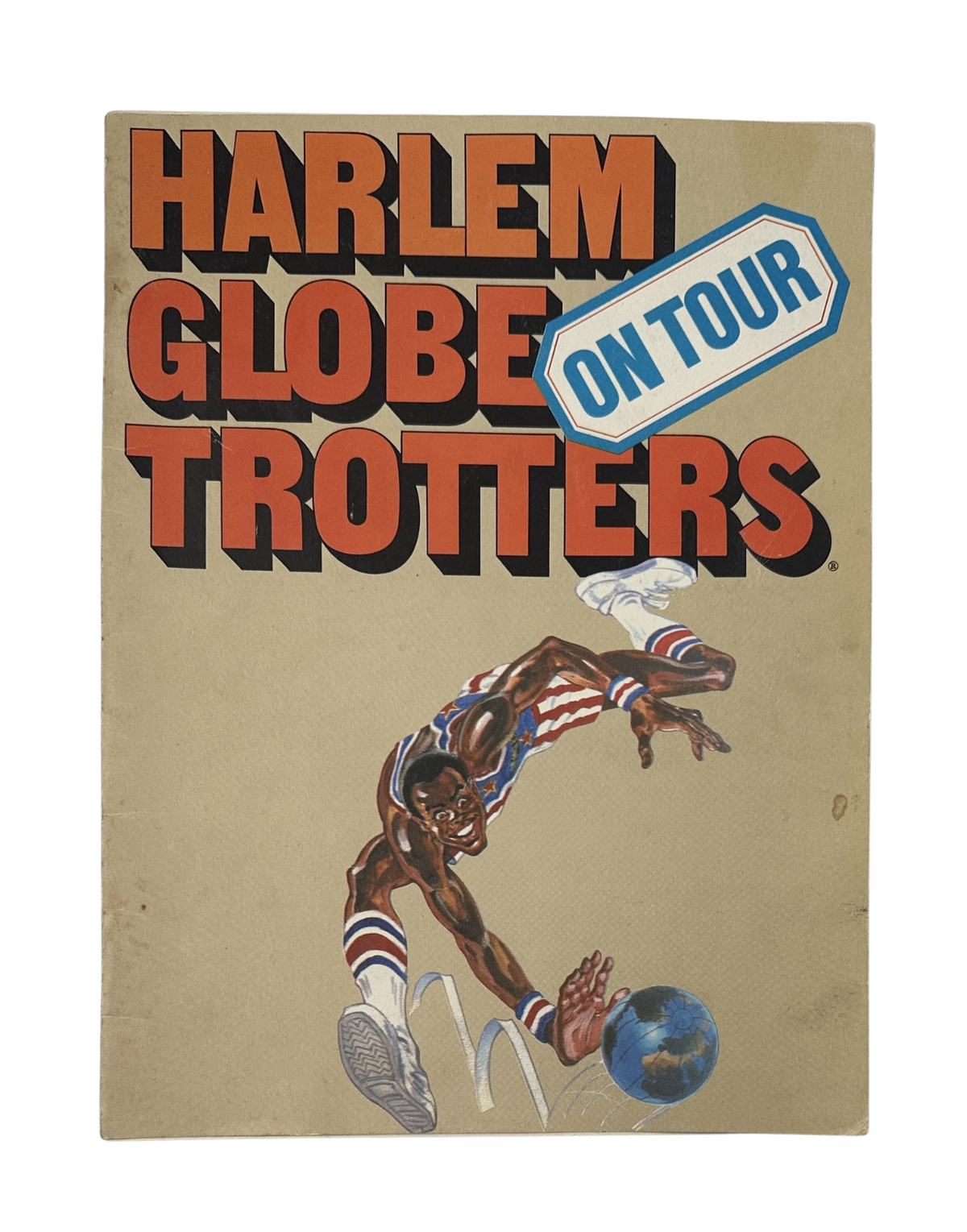 Cover of Harlem Globetrotters Magazine On Tour featuring a dynamic illustration of a player in action, showcasing the team's vibrant branding and basketball theme.