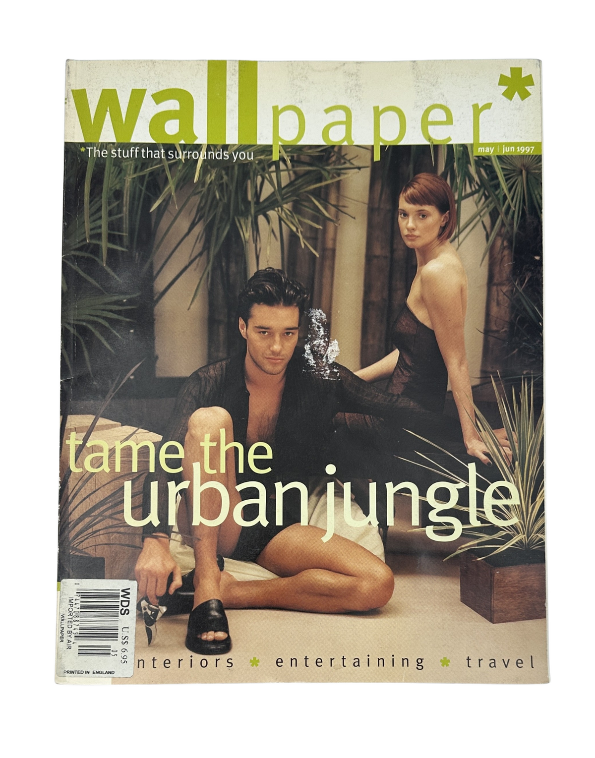Wallpaper Magazine May/June 1997 featuring a stylish couple in an urban jungle setting, highlighting interior design and travel themes.
