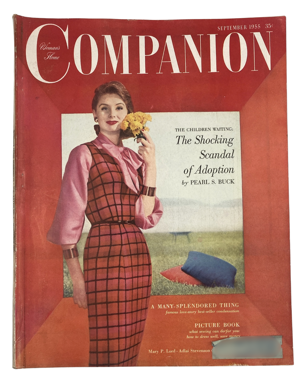 Cover of Woman's Home Companion Magazine September 1955 featuring a model in a pink blouse and plaid skirt holding flowers, highlighting the article 'The Shocking Scandal of Adoption' by Pearl S. Buck.