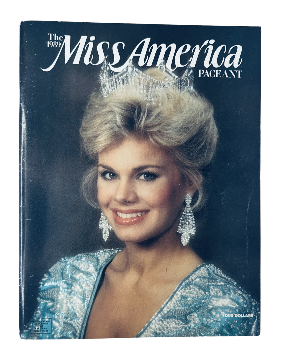 Cover of The 1989 Miss America Pageant Official Program featuring Gretchen Carlson, showcasing her in a sparkling crown and elegant attire.