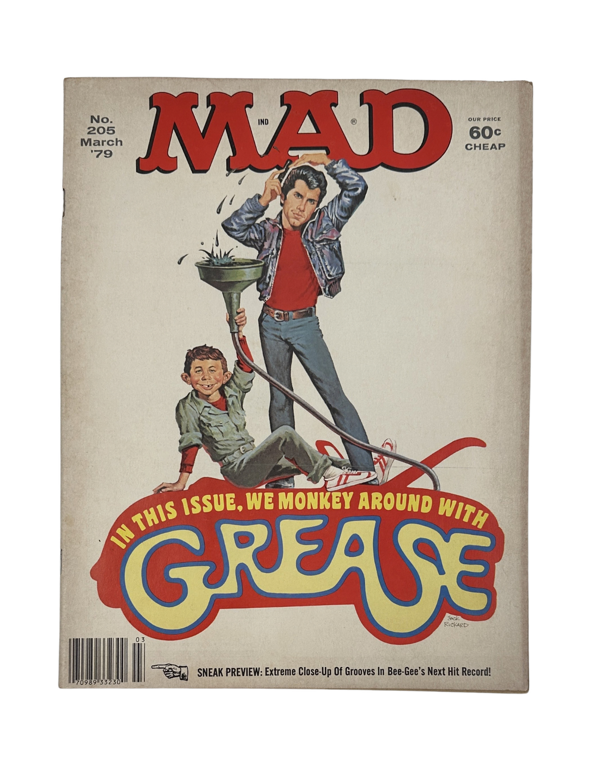 MAD Magazine No. 205 from March 1979 featuring a parody of the film Grease, showcasing humor and satire. The cover depicts a playful illustration, prominently stating 'In this issue, we monkey around with Grease.' Ideal for collectors and fans of classic comic magazines.