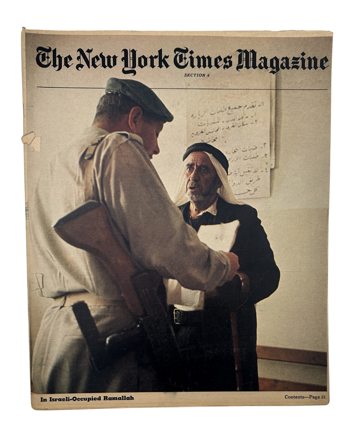 Cover of The New York Times Magazine featuring a scene in Israeli-Occupied Ramallah, depicting a military policeman interacting with an Arab elder.