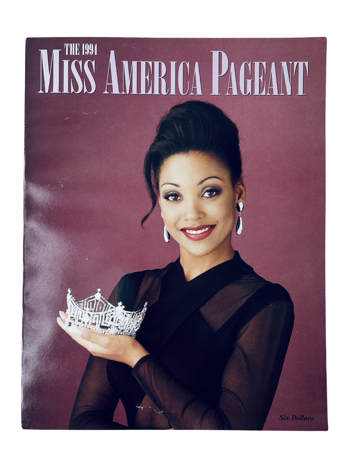 Cover of The 1994 Miss America Pageant Magazine featuring Kimberly Aiken holding a crown, showcasing the official program.