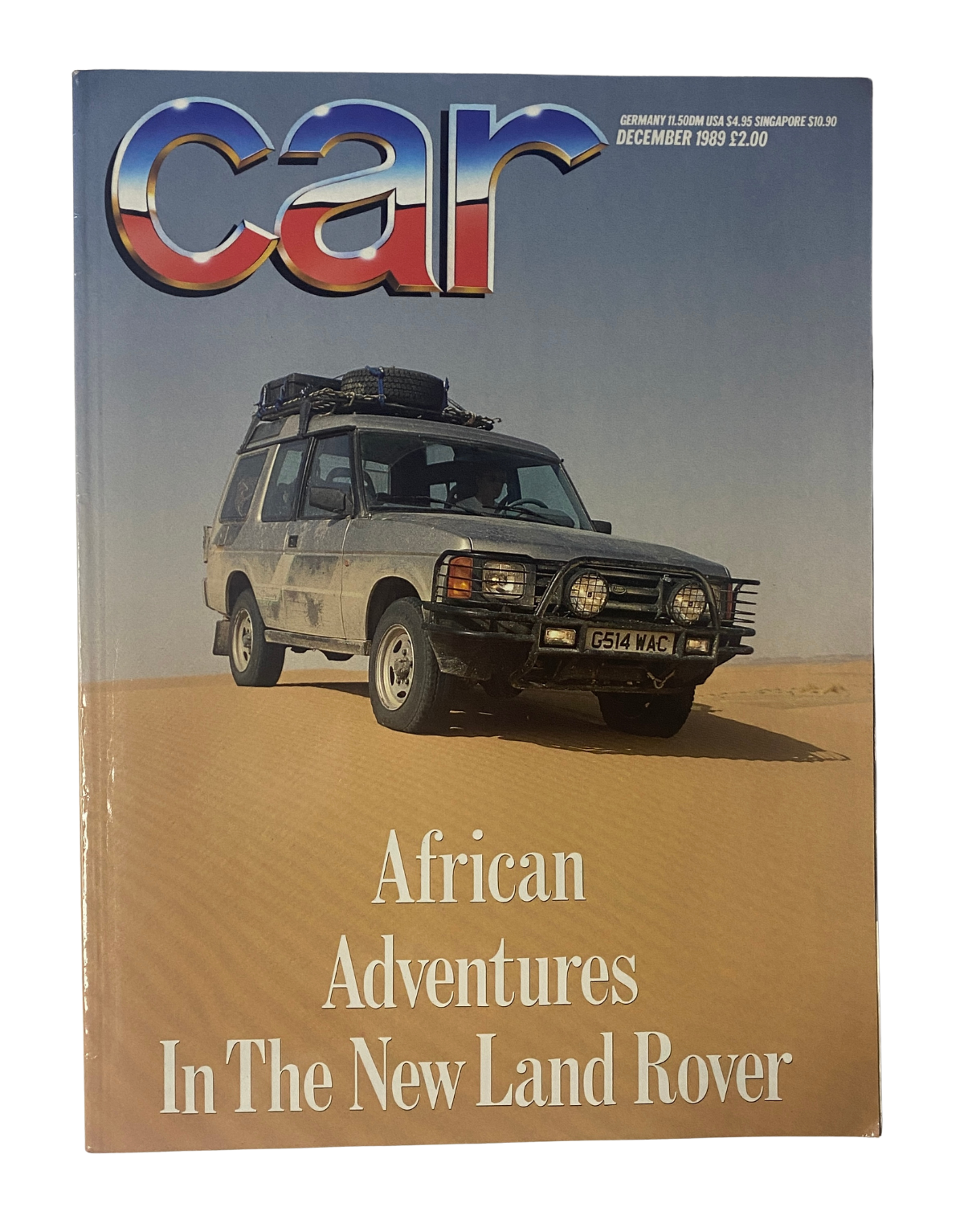 Cover of CAR Magazine December 1989 featuring a Land Rover Discovery in an African desert landscape with the title 'African Adventures In The New Land Rover'.
