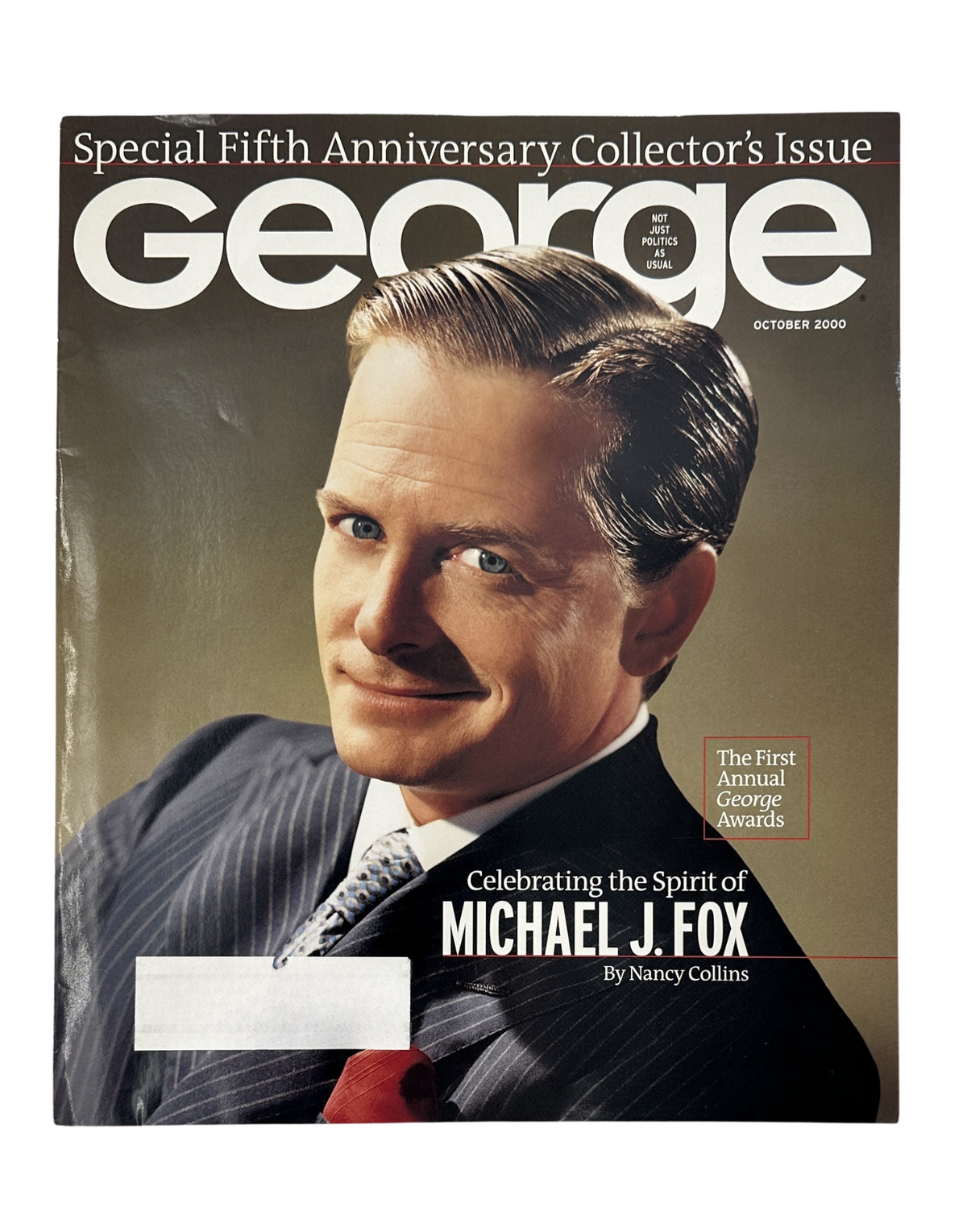 George Magazine October 2000 featuring Michael J. Fox on the cover. This special issue celebrates the spirit of Michael J. Fox and highlights the first annual George Awards.