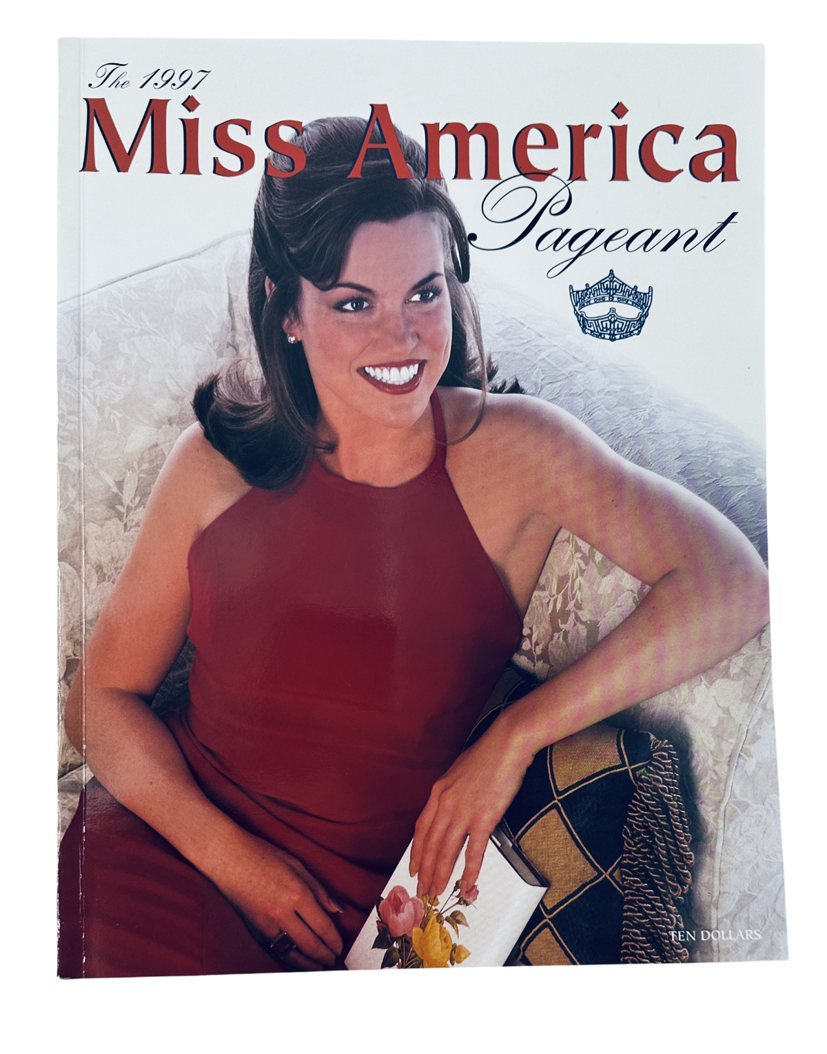 Cover of The 1997 Miss America Pageant Magazine Program featuring Tara Dawn Holland, showcasing her in a red dress that highlights the theme of the pageant.