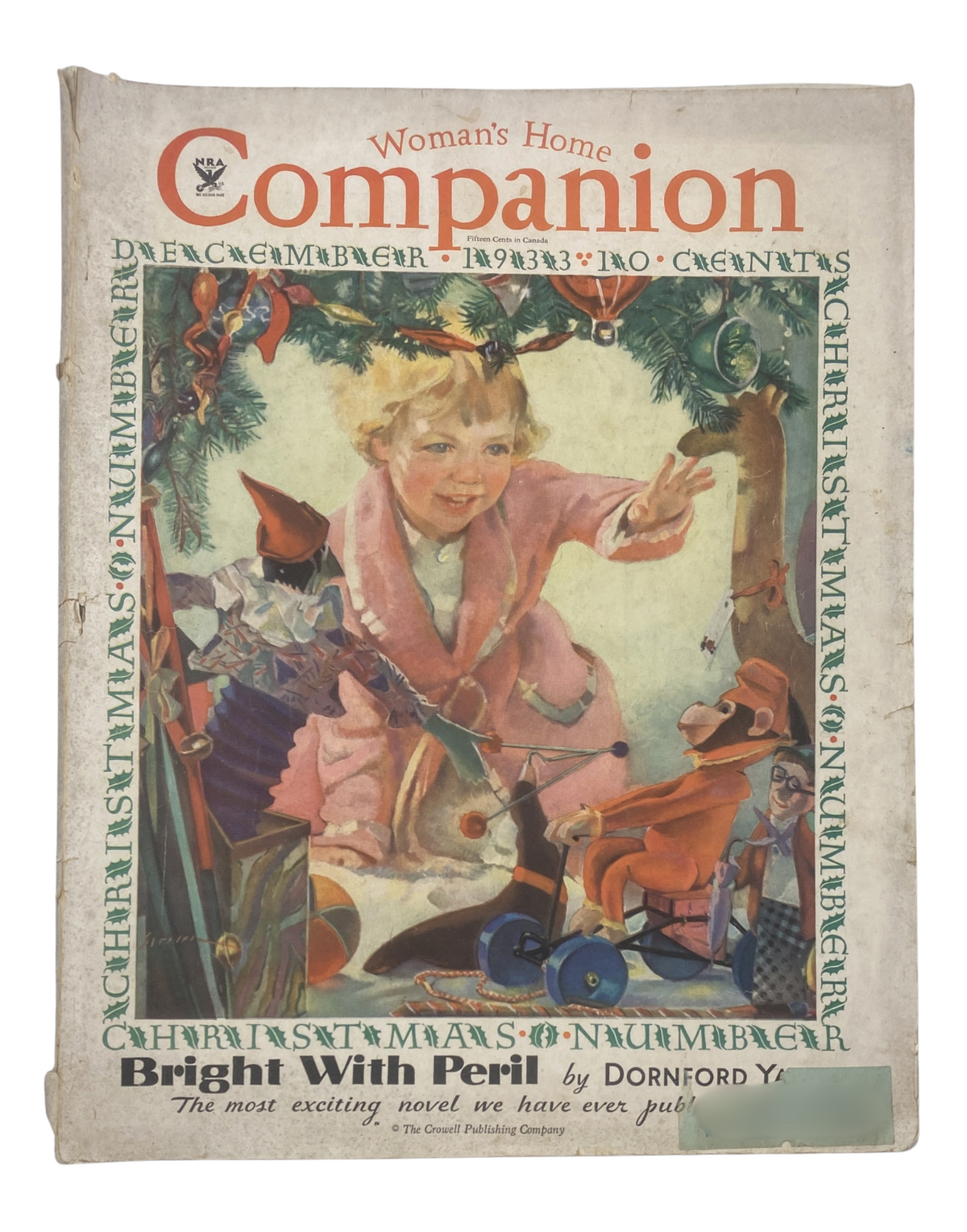 Woman's Home Companion Magazine December 1933 titled 'Christmas Bright with Peril,' featuring a vintage illustration of a child amidst Christmas decorations.