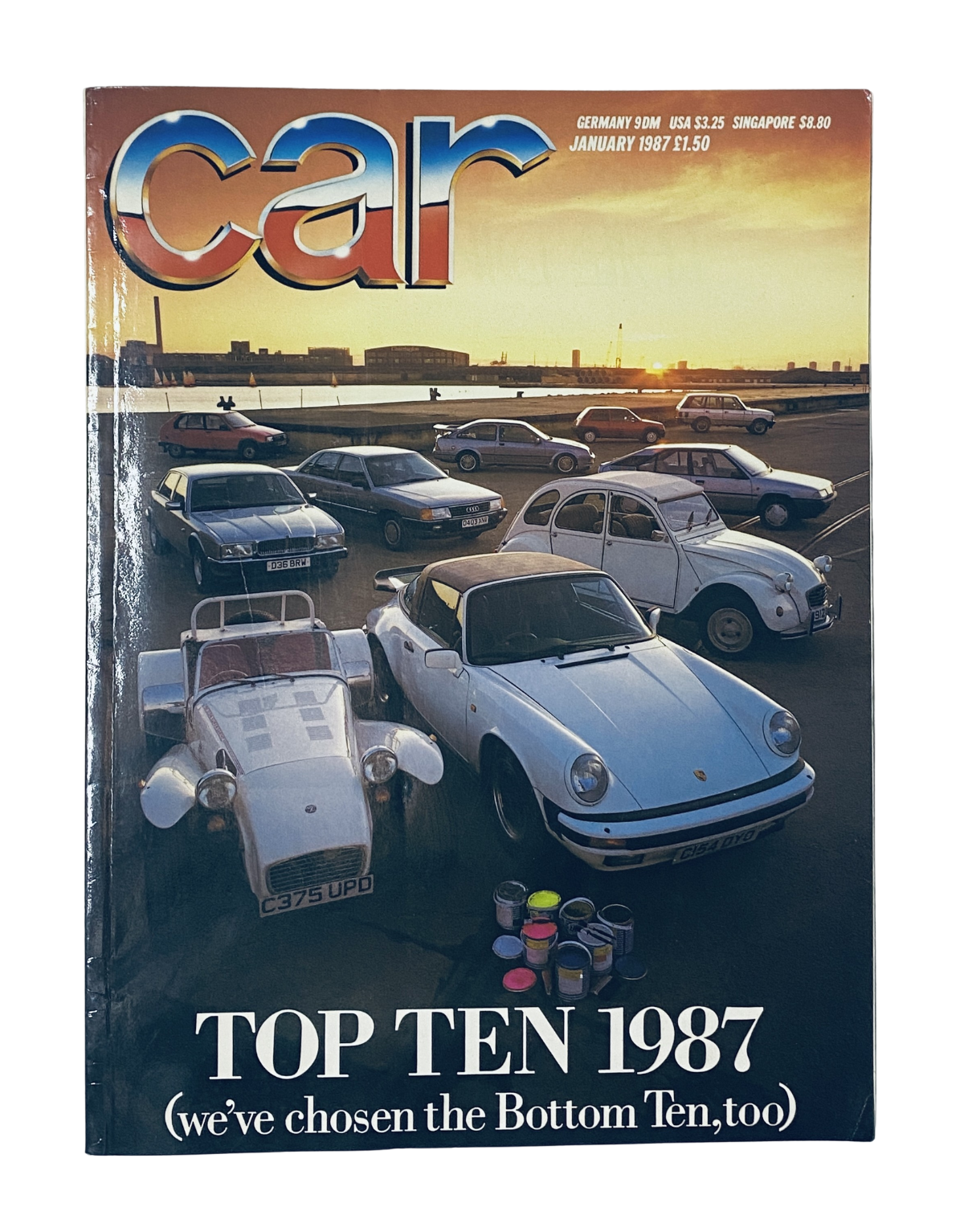 Car Magazine January 1987 cover featuring the Top Ten cars of the year, showcasing various classic cars including a Porsche 911 and a Citroen 2CV on a scenic rooftop location.