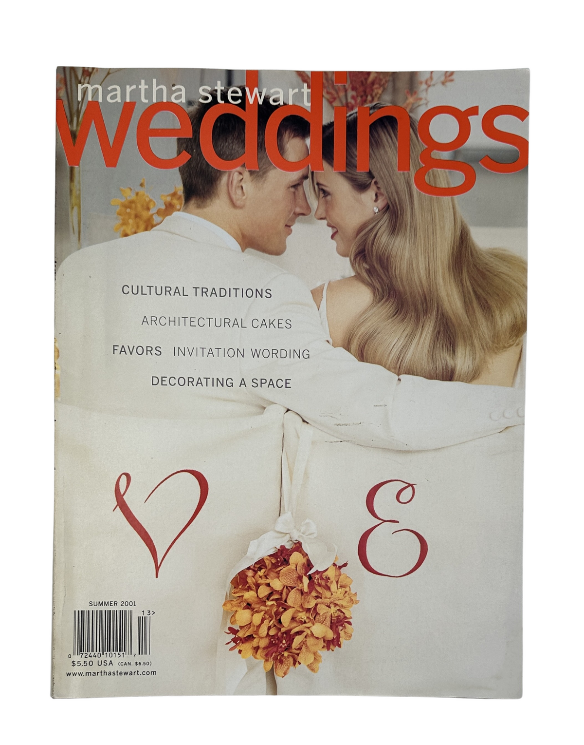 Cover of Martha Stewart Weddings Magazine Summer 2001 featuring a couple, with a focus on Cultural Traditions, Architectural Cakes, Favors, and Invitation Wording.