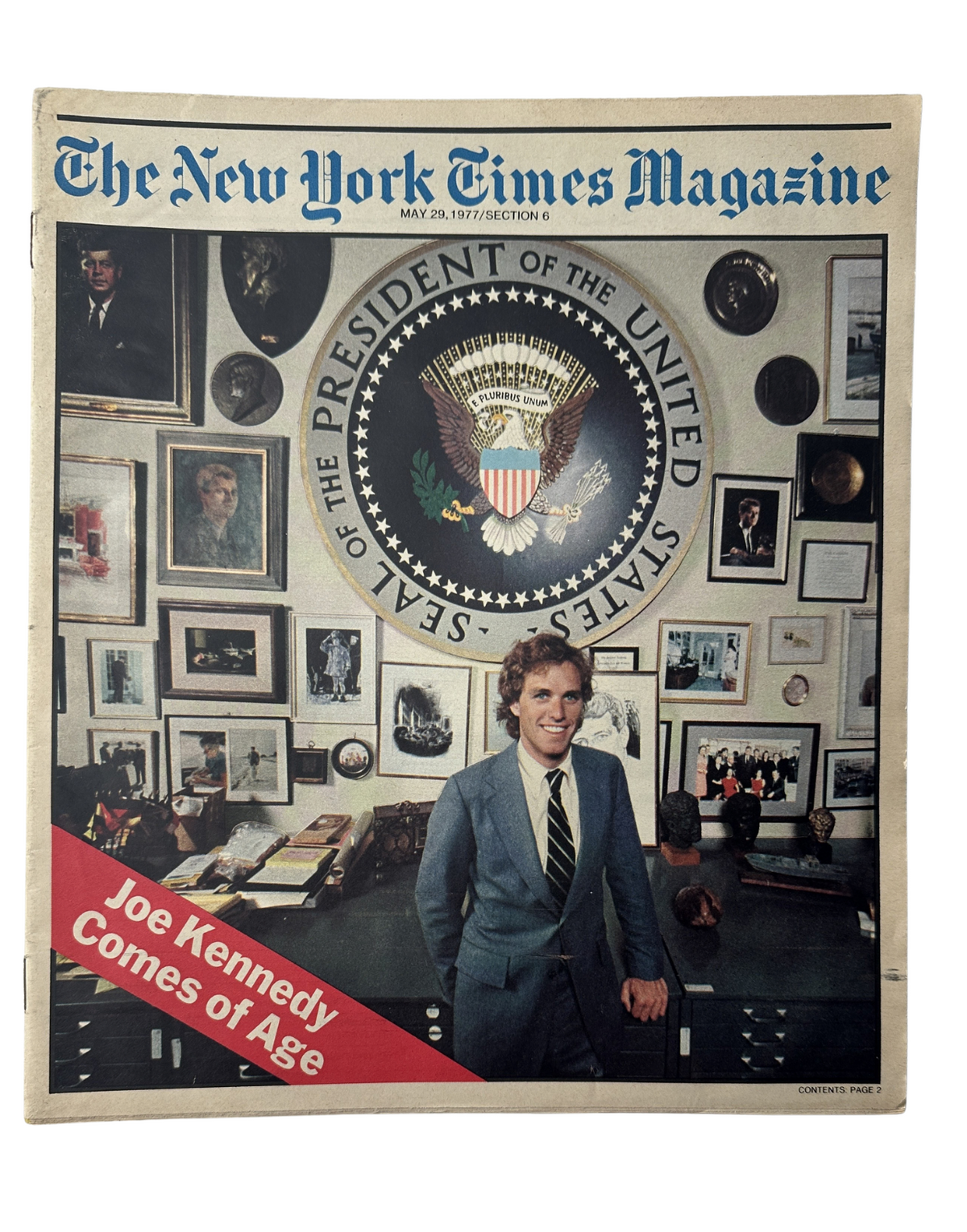 Front cover of The New York Times Magazine dated May 29, 1977, featuring the title 'Joe Kennedy Comes of Age' along with a photograph of Joe Kennedy in a formal outfit standing in an office decorated with photos and accolades.