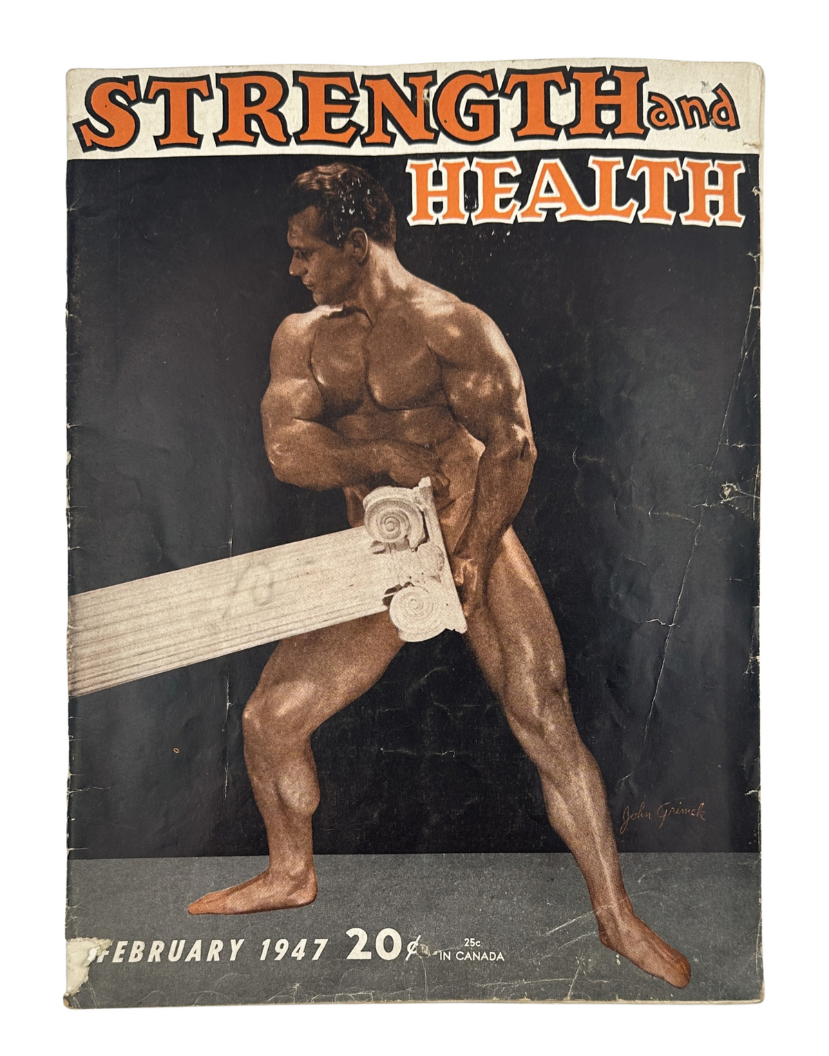Cover of Strength and Health Magazine February 1947 featuring John Grimek, showcasing his muscular physique while holding a barbell, emphasizing strength and fitness.