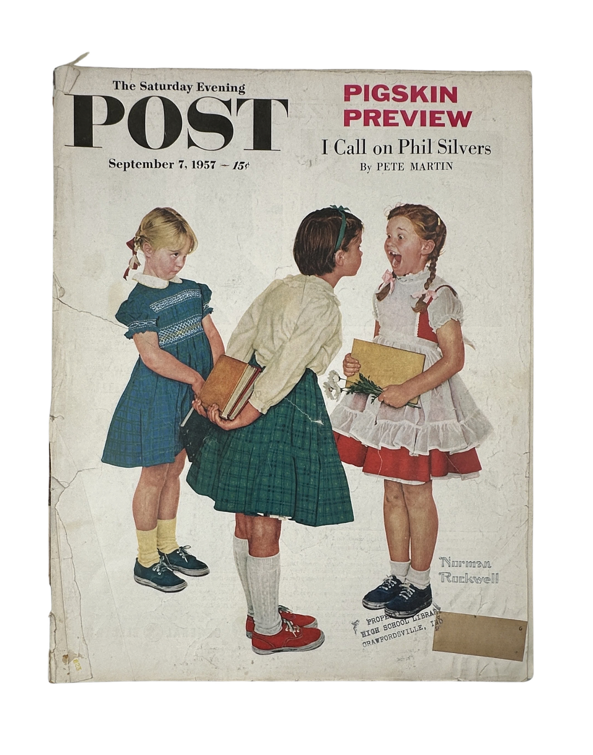 Cover of the Saturday Evening Post Magazine from September 7, 1957 featuring the title 'Pigskin Preview' and an illustration by Norman Rockwell of three children, capturing a playful moment.