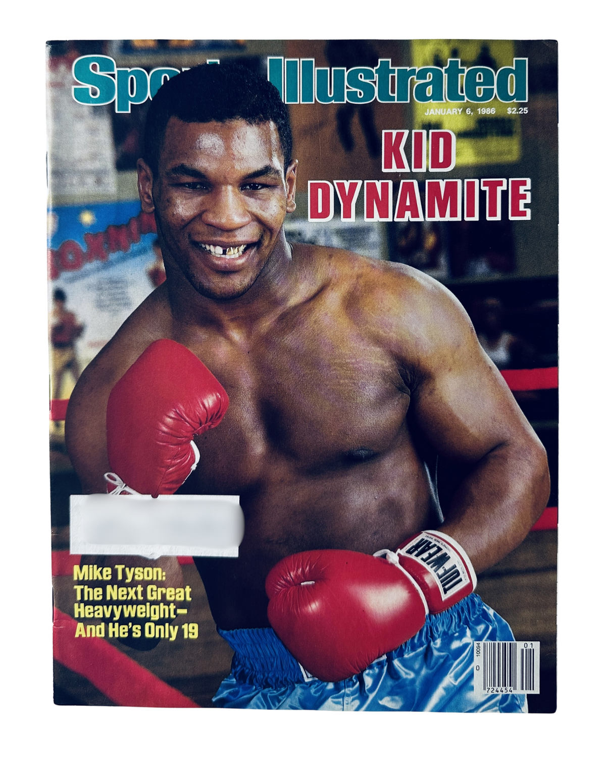Cover of Sports Illustrated Magazine January 6, 1986 featuring Mike Tyson, titled 'Kid Dynamite'. The magazine highlights Tyson's rise as a boxing champion at just 19 years old.