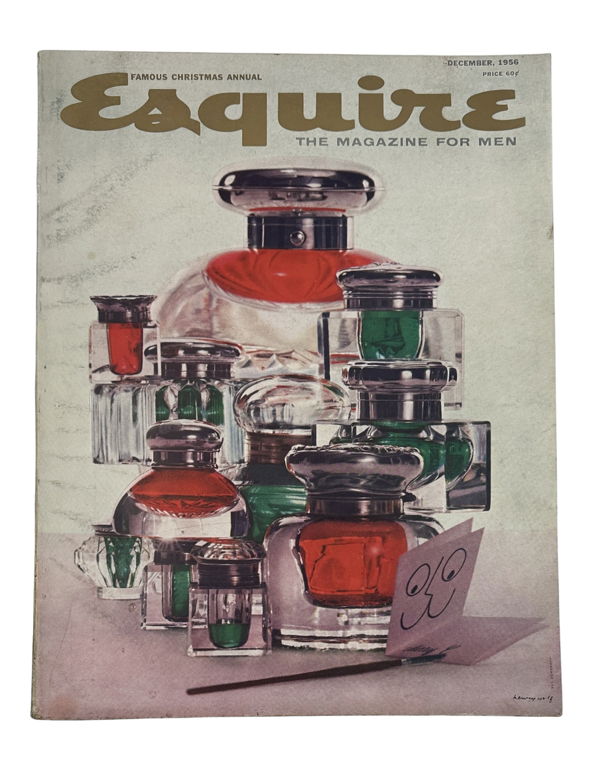 Esquire Magazine December 1956 cover featuring a collection of vintage perfume bottles, showcasing a unique design aesthetic.
