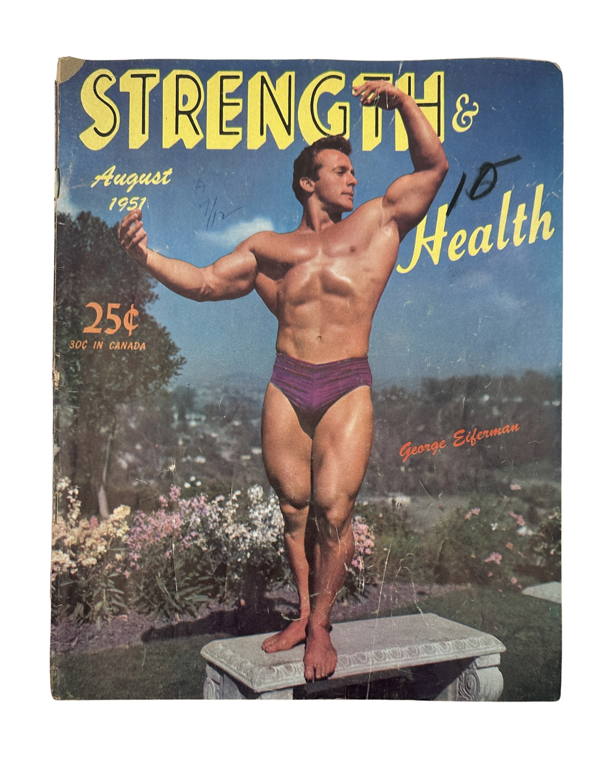 Strength and Health Magazine August 1951 featuring George Eiferman on the cover, showcasing a muscular pose against a scenic background.