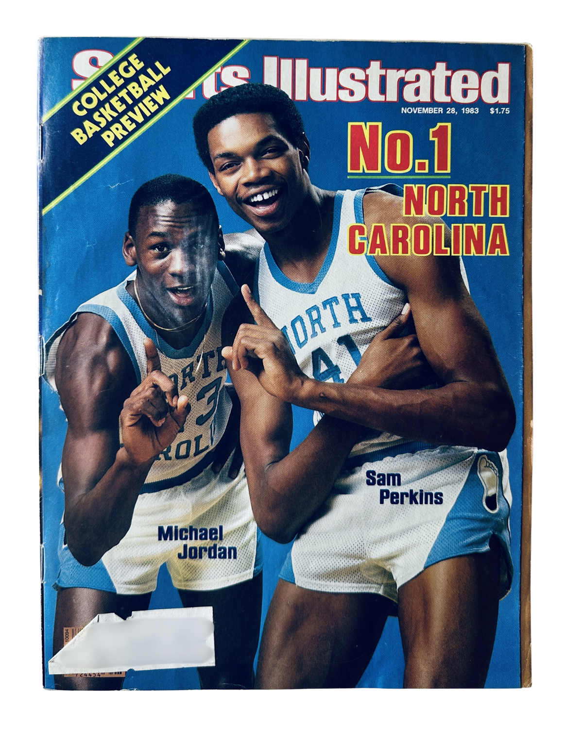 Sports Illustrated Magazine cover from November 28, 1983 featuring Michael Jordan and Sam Perkins of North Carolina. The magazine highlights the theme of the College Basketball Preview, showcasing the duo as a top-ranked team.