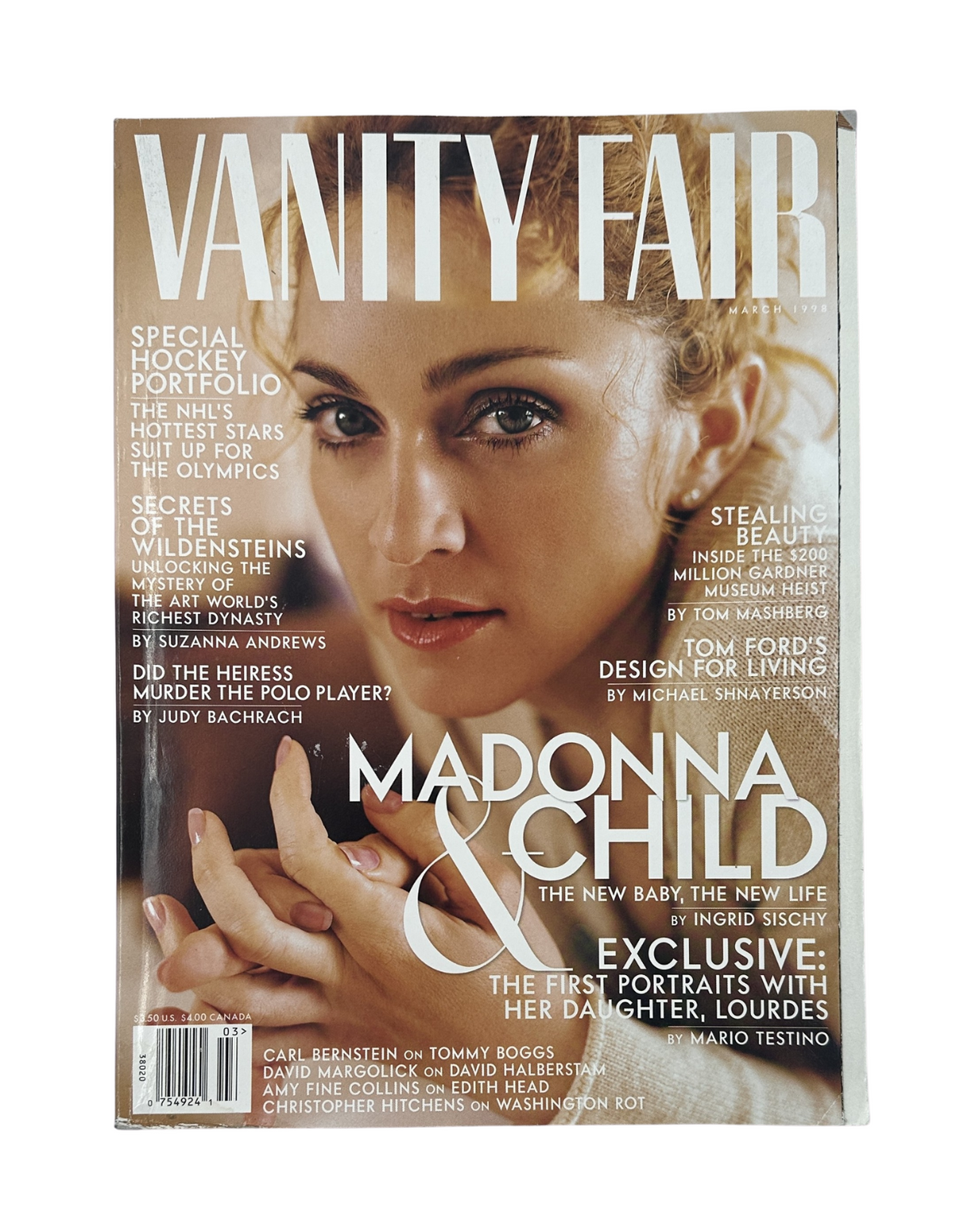 Cover of Vanity Fair Magazine, March 1998, featuring Madonna and Child with the title 'Madonna & Child' and highlights on special features including NHL Hockey.