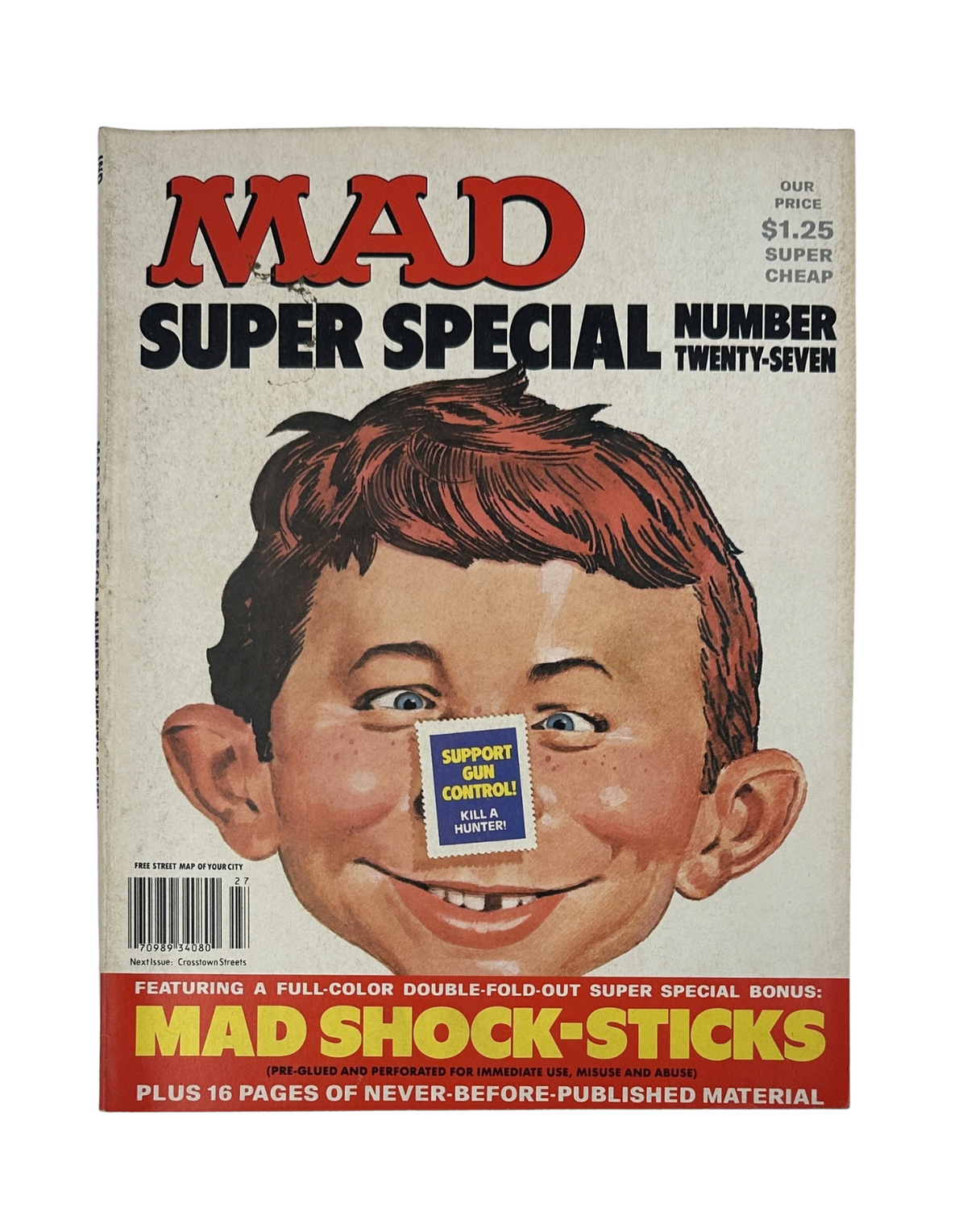 Cover of MAD Magazine Super Special No. 27 from 1978 featuring a humorous illustration of a smiling character, showcasing the MAD Shock-Sticks insert, and advertising a price of $1.25.