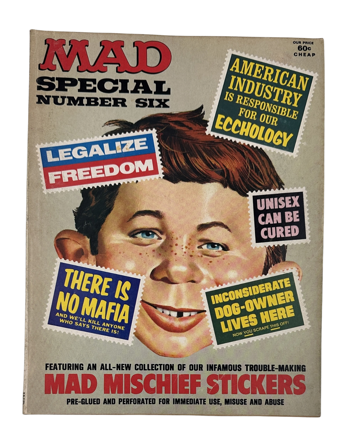 Cover of MAD Magazine Special No. 6 from 1971 featuring a humorous depiction of a boy, accompanied by bold slogans like 'Legalize Freedom' and 'American Industry is Responsible for Our Ecchology'. This edition includes MAD Mischief stickers.
