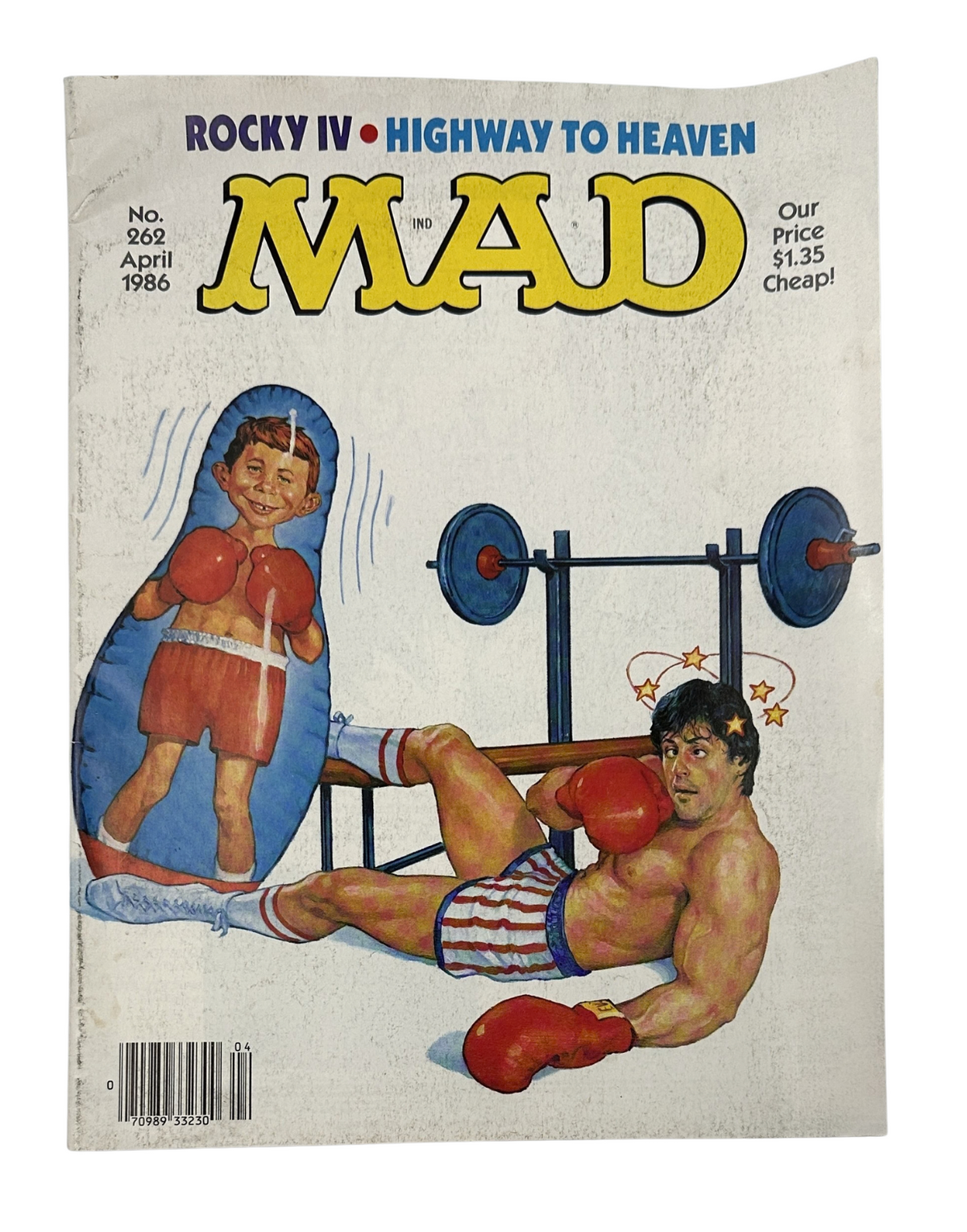 Cover of MAD Magazine No. 262 from April 1986 featuring a parody of Rocky IV and Highway to Heaven, illustrating a humorous scene with a boxing theme.