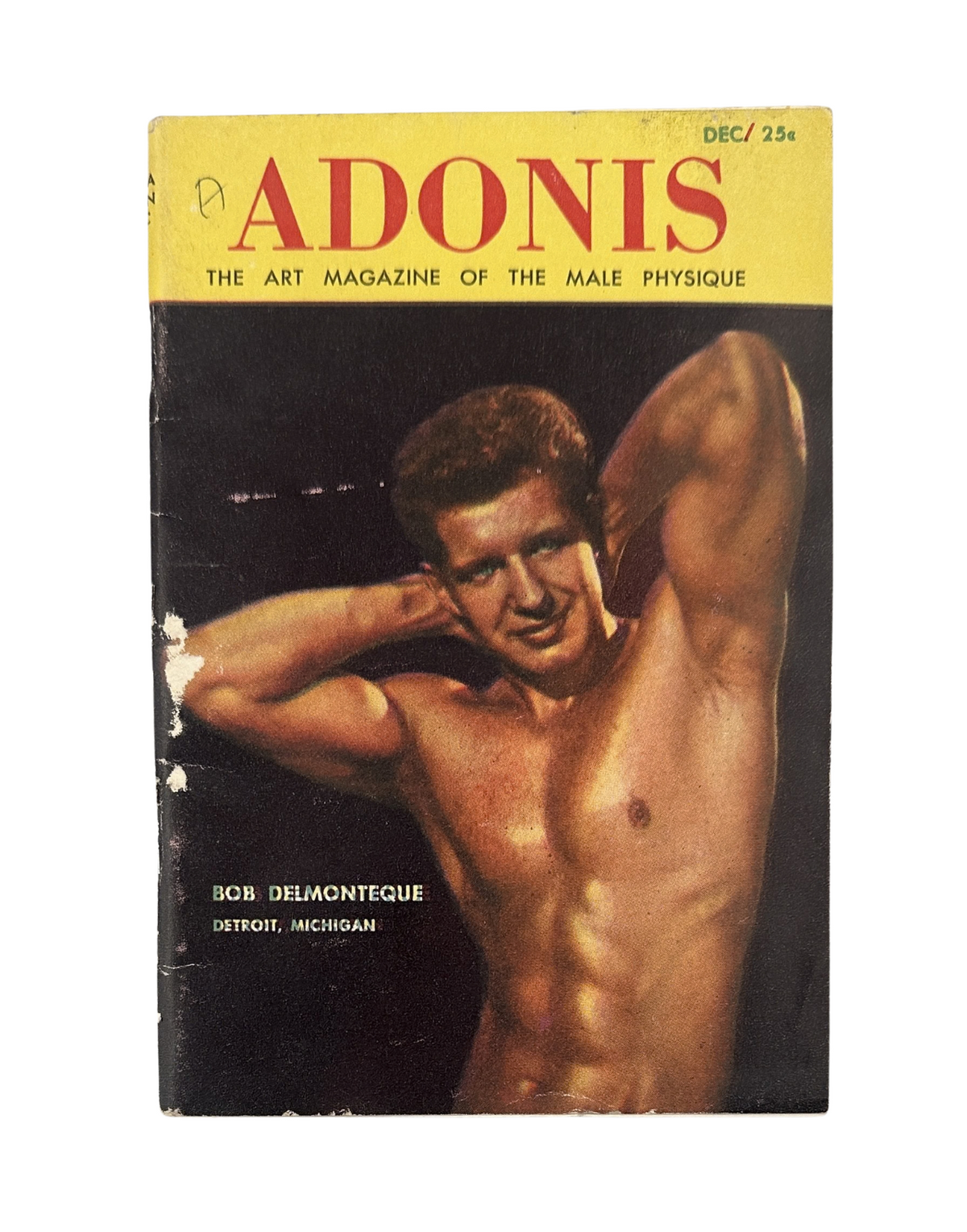 ADONIS bodybuilding muscle beefcake PREMIERE ISSUE #1 cover featuring a muscular man, Bob Delmonteque, showcasing the art of the male physique, published in 1954.