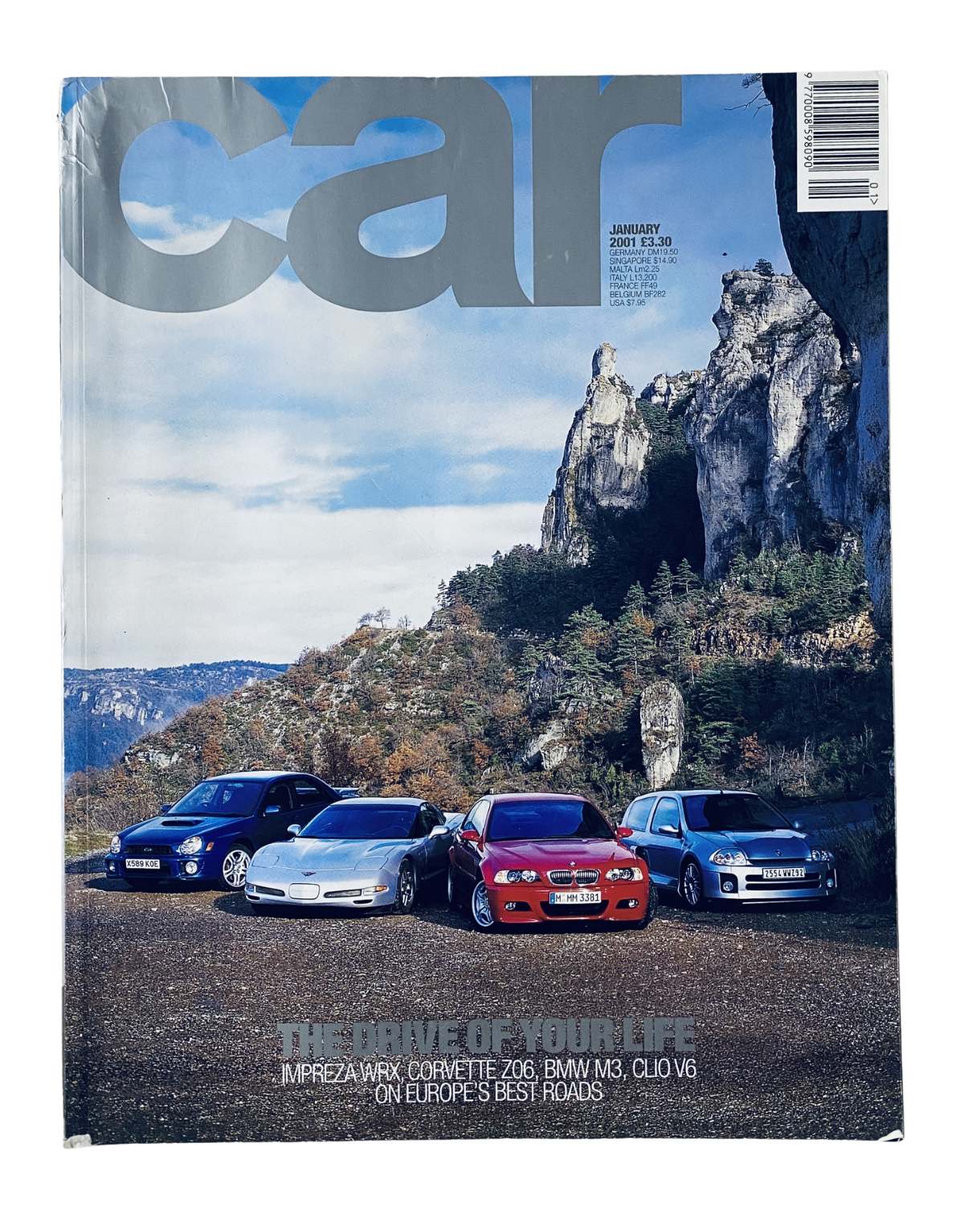CAR Magazine cover from January 2001 featuring the Subaru Impreza WRX, Corvette Z06, BMW M3, and Clio V6, showcasing European road tests.