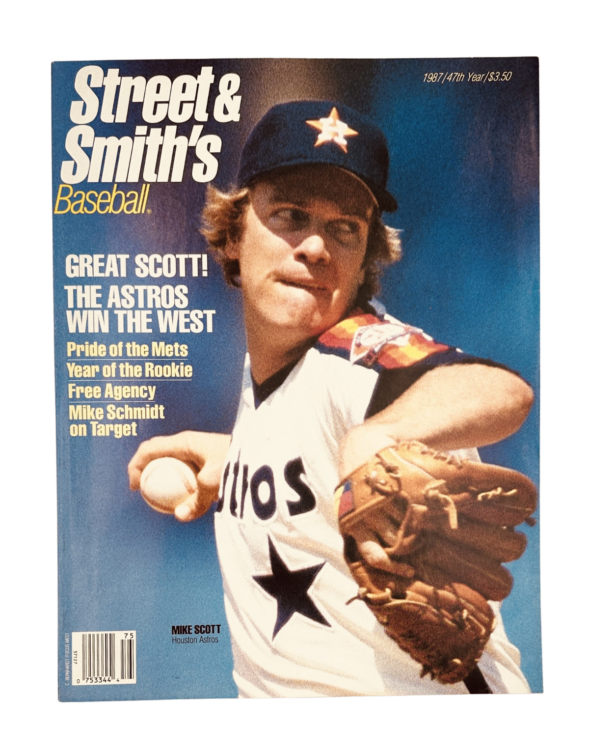 Cover of Street and Smith’s Baseball Magazine 1987 Yearbook featuring Mike Scott of the Houston Astros, celebrating their victory in the Western division. The magazine highlights key topics like 'Pride of the Mets,' 'Year of the Rookie,' and 'Free Agency,' showcasing professional baseball discussions and player spotlights.