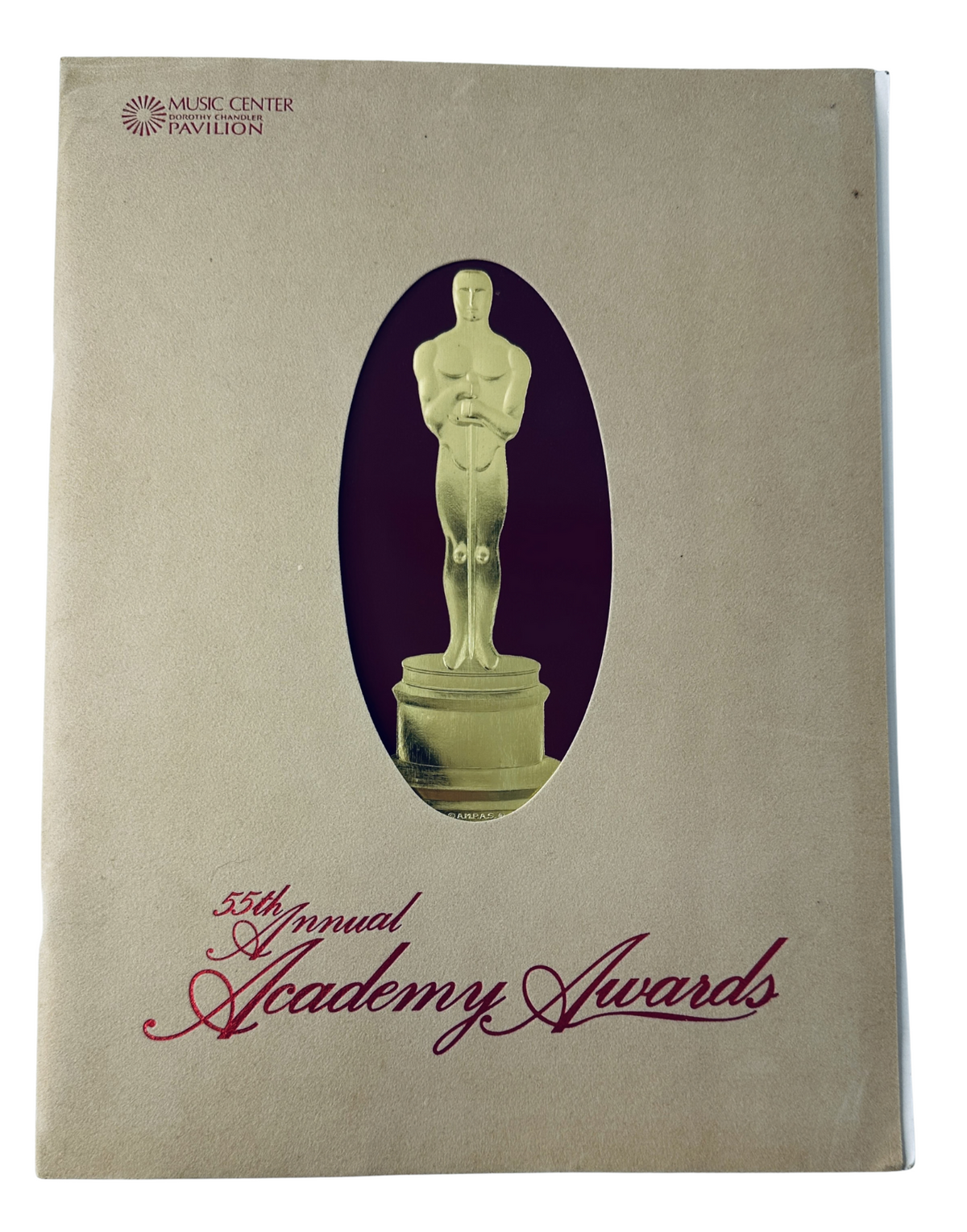 Cover of 'Oscar Magazine 55th Annual Academy Awards Program April 11, 1983' featuring a statue of the Oscar award on the front.