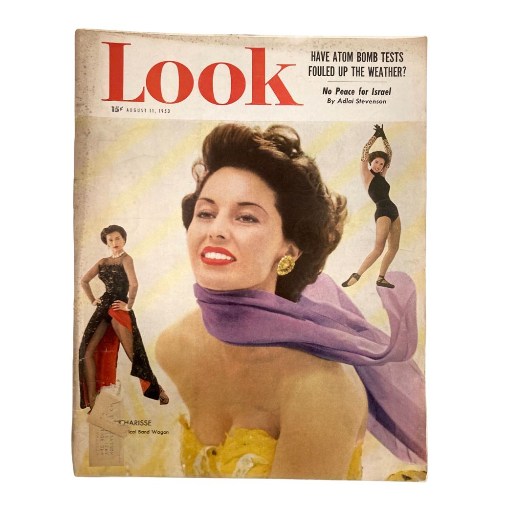 VTG Look Magazine August 11 1953 featuring Cyd Charisse on the cover, captured by Tony Vaccaro, showcasing a glamorous yellow outfit and vibrant imagery.