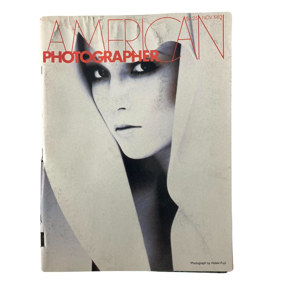 Cover of American Photographer Magazine November 1983 featuring an iconic Pola Cosmetics design, highlighting a model's striking features with dramatic photography by Hideki Fuji.