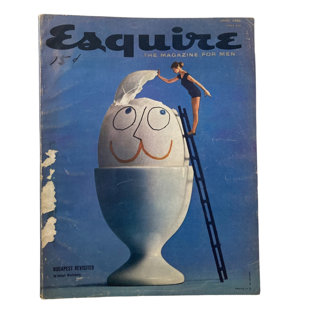 VTG Esquire Magazine April 1956 Cover featuring an artistic illustration of a woman on a ladder interacting with an oversized egg, representing the theme 'Budapest Revisited.'