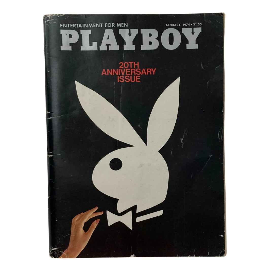 VTG Playboy Magazine January 1974 20th Anniversary Issue cover featuring the iconic bunny logo and a hand holding the magazine.