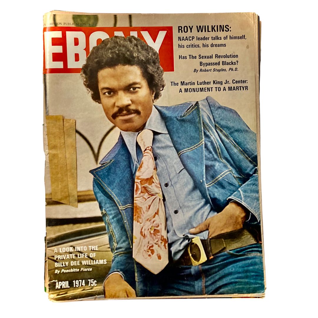 VTG Ebony Magazine April 1974 featuring Billy Dee Williams on the cover, showcasing a stylish photo of him in a blue suit with a floral tie, highlighting significant cultural themes and personalities from the 1970s.