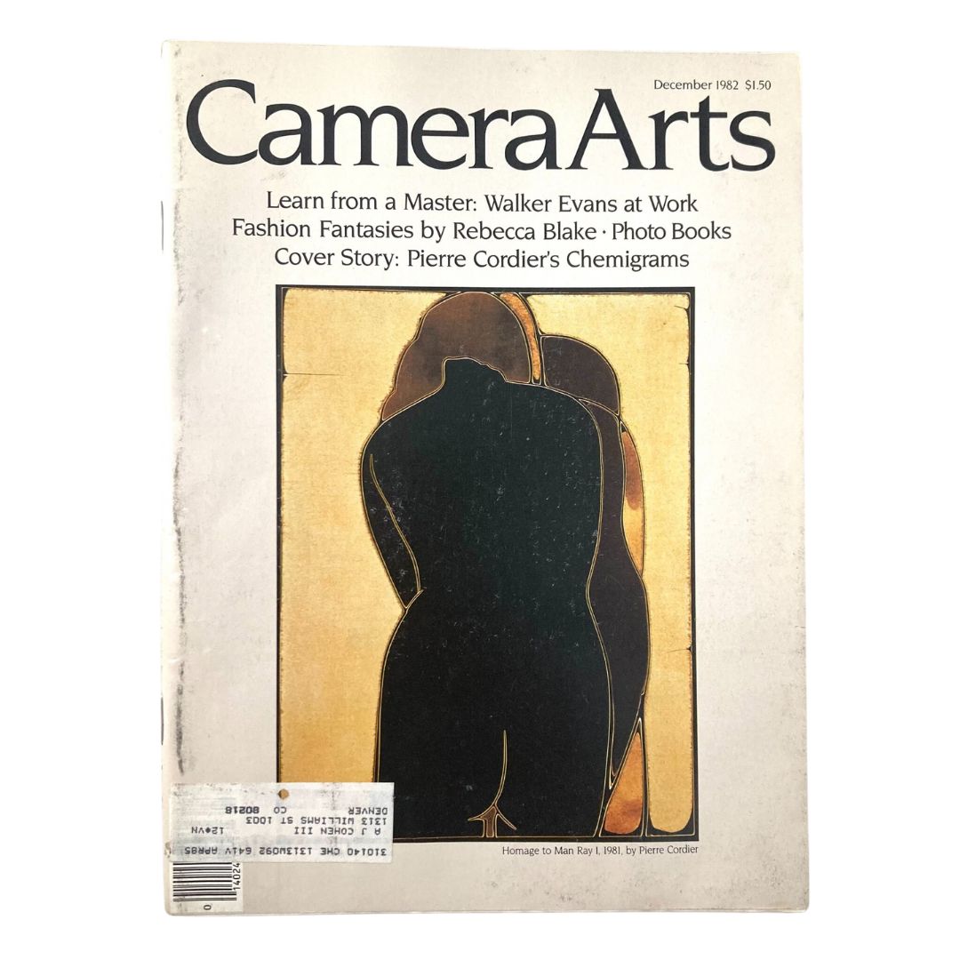 Cover of Camera Arts Magazine December 1982 featuring 'Homage to Man Ray I, 1981' by Pierre Cordier. The design includes artistic silhouettes, reflecting the innovative spirit of photography in the early 1980s.