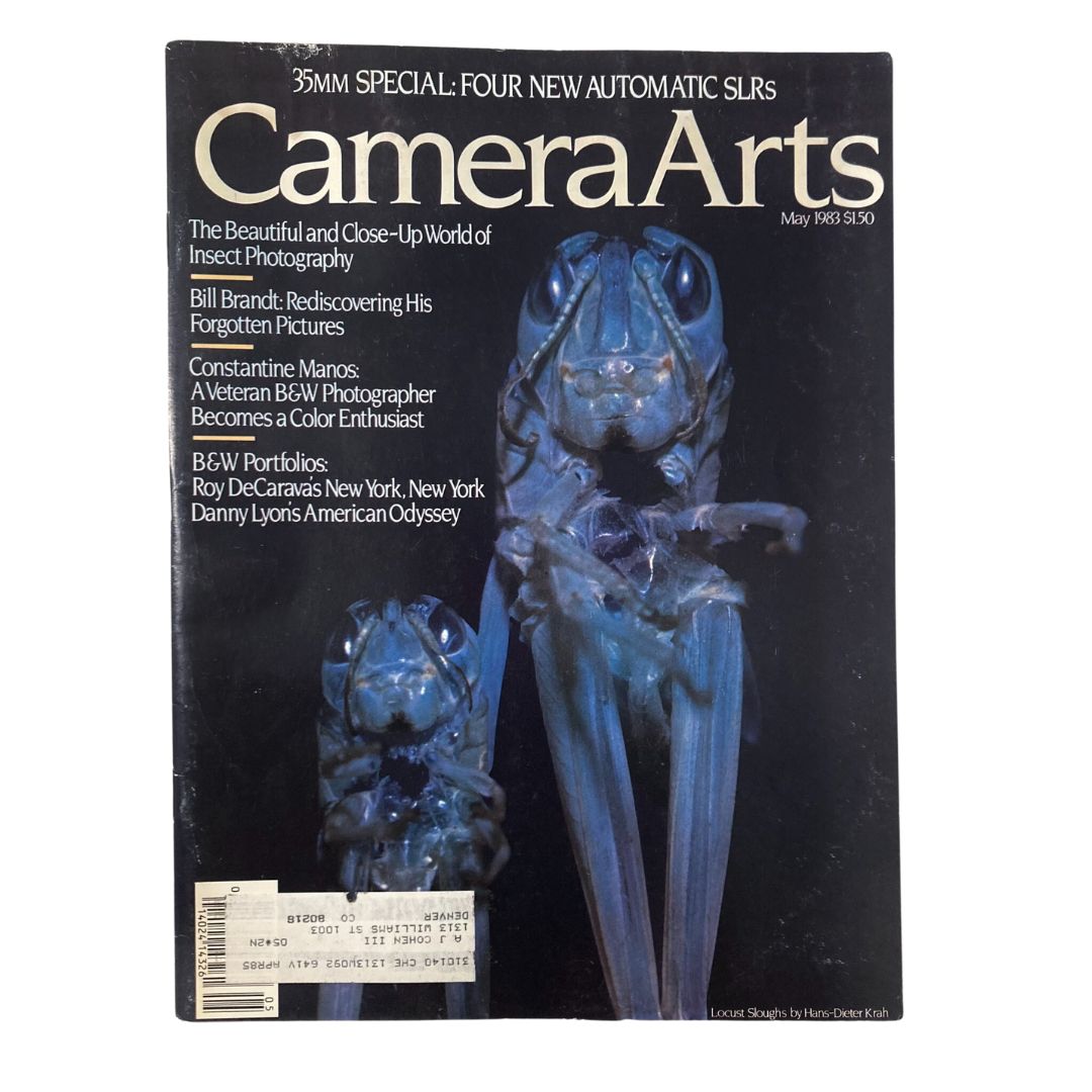 Cover of Camera Arts Magazine May 1983 featuring Locust Sloughs by Hans-Dieter Krah, showcasing striking blue photograph of insects.