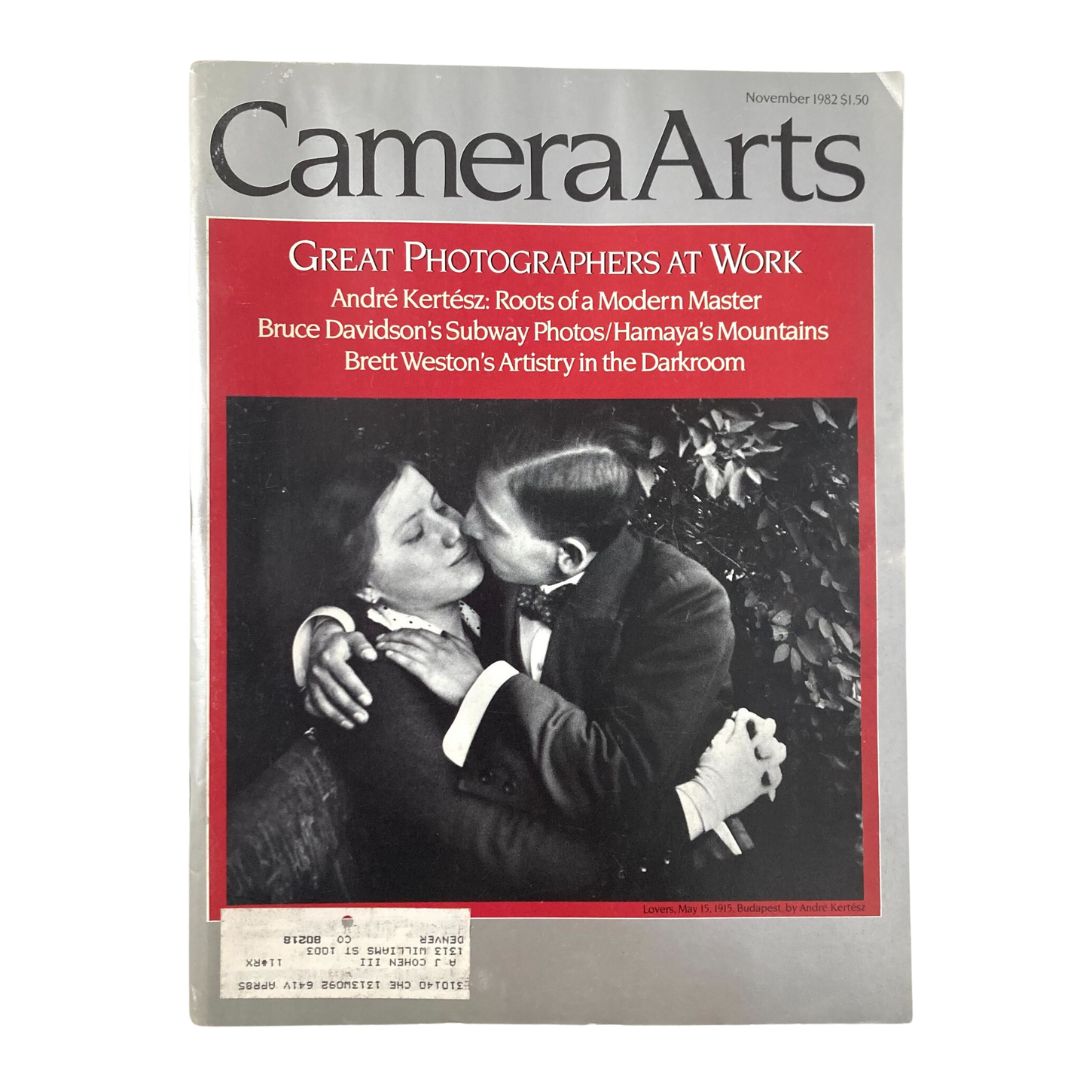 Cover of VTG Camera Arts Magazine November 1982 featuring the captivating photograph 'Lovers, May 15 1915 Budapest' by Andre K. This image illustrates a romantic moment captured in black and white, showcasing classic photography from the 1980s.