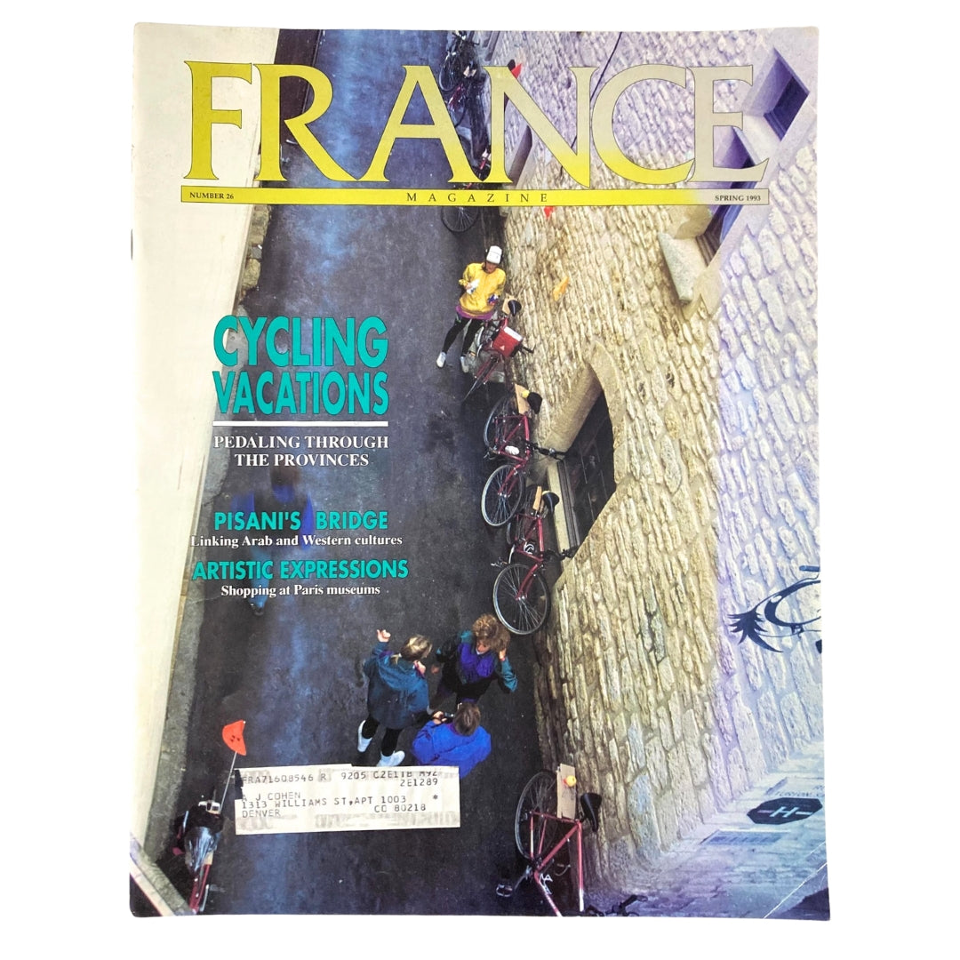 France Magazine Spring 1993 No. 26 featuring Cycling Vacations, Pedaling Through Provinces, with an image of cyclists in a charming alleyway. The magazine cover highlights cultural articles including Pisani's Bridge and Artistic Expressions.