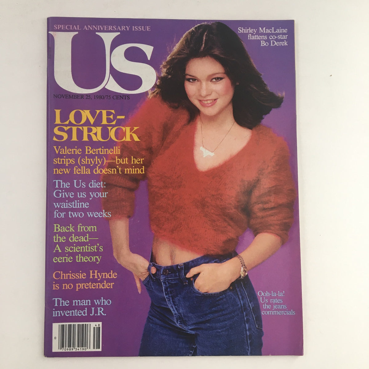Cover of US Magazine from November 25, 1980 featuring Valerie Bertinelli in a stylish red sweater and blue jeans, with the title 'LOVE-STRUCK'. The cover highlights stories including Valerie Bertinelli and Chrissie Hynde, showcasing a vibrant piece of 1980s pop culture.