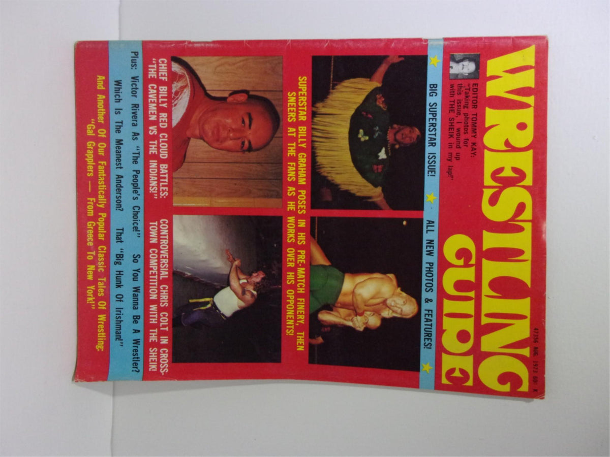 Wrestling Guide August 1973 magazine cover featuring Billy Graham and Billy Red, showcasing vintage wrestling themes and headlines.