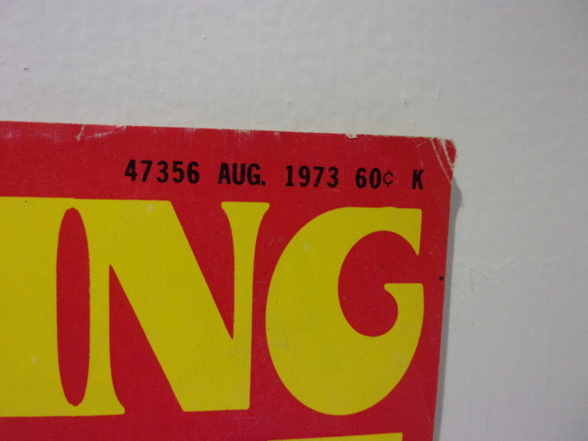 Top corner of the Wrestling Guide August 1973 magazine displaying the month and price, emphasizing the historical nature of this wrestling collectible.