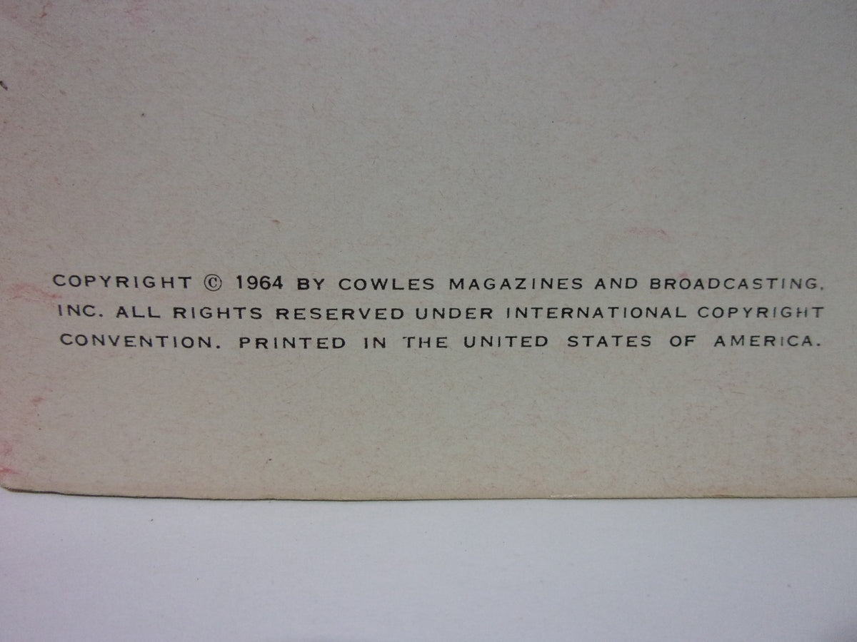 Back cover of the 1964 Look Magazine: JFK Memorial Book with copyright information, confirming its 1964 publication by Cowles Magazines and Broadcasting.