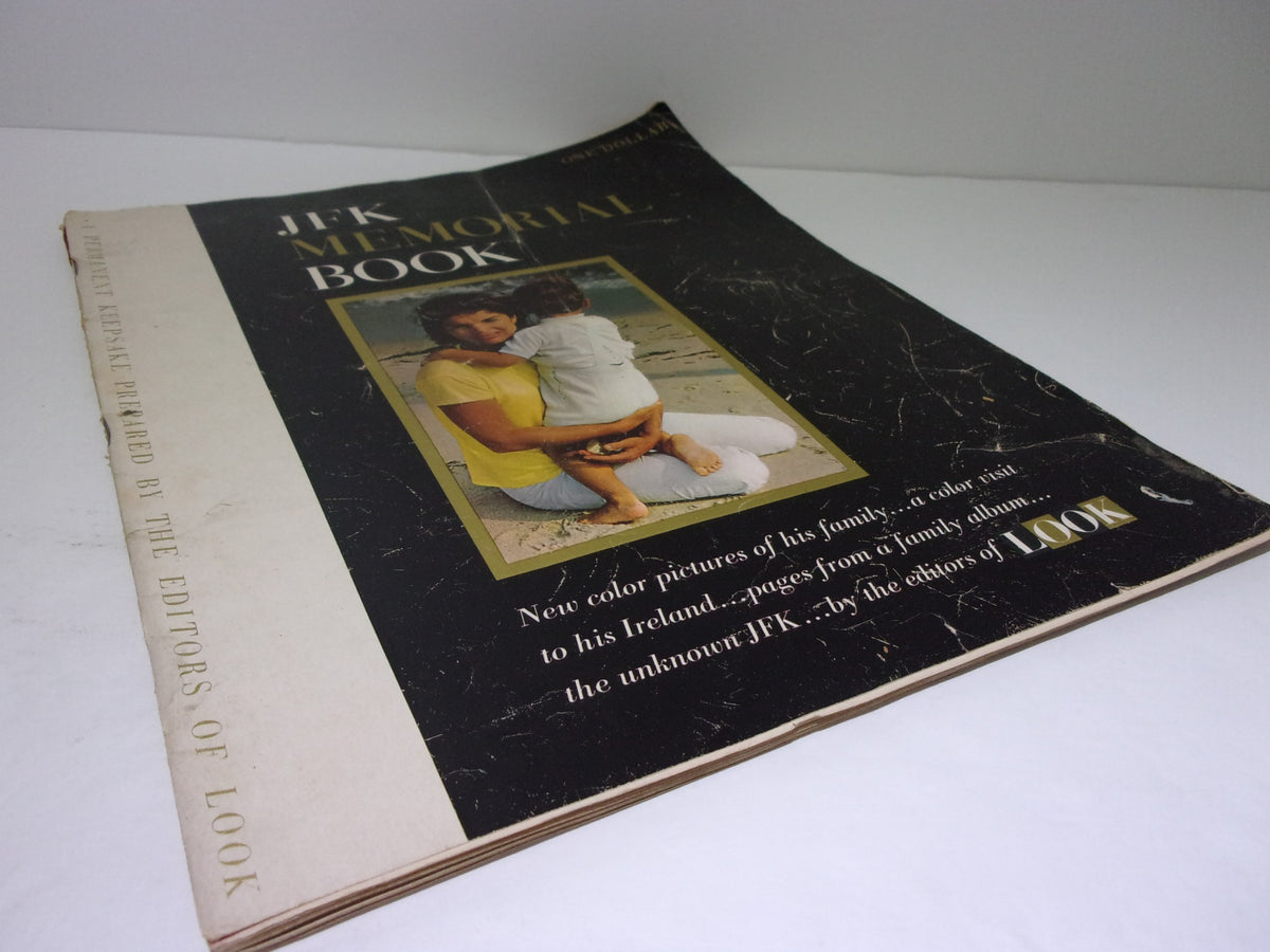 Front cover of the 1964 Look Magazine: JFK Memorial Book displaying the title and an image of JFK's family.