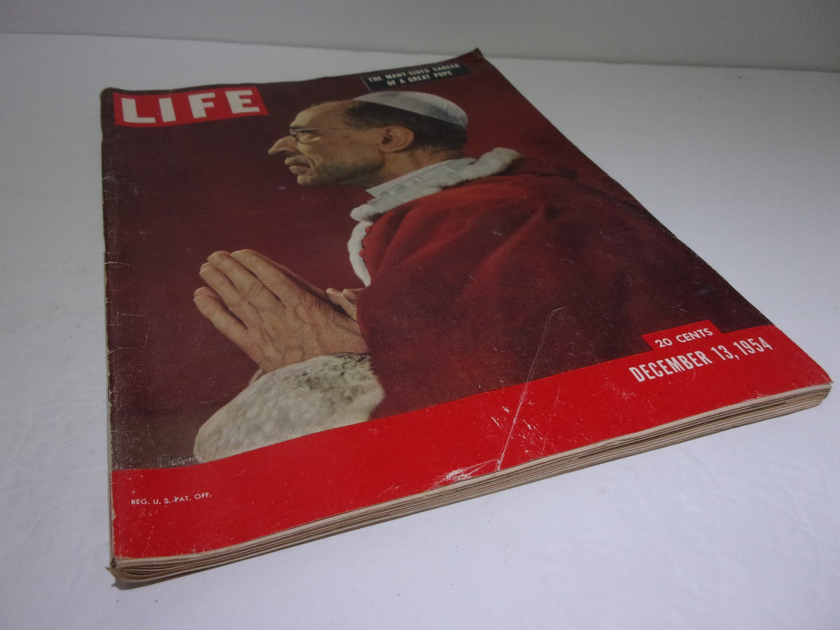 Cover image of Life Magazine: December 13 1954, featuring Pope Pius XII in profile, emphasizing his significance and dignified pose.