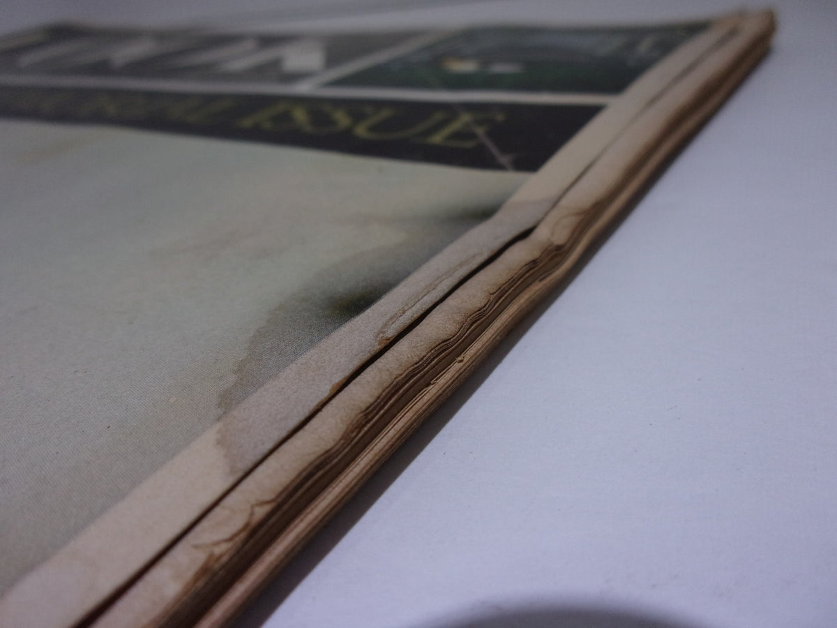 Detailed image of the edge of Look Magazine: The JFK Memorial Issue, November 17, 1964, highlighting the aged paper and slight discoloration, indicative of its historical significance.